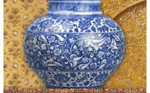 Vase with blue and white decorative background