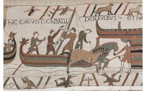 Norman Arrival in England scene from the Bayeux Tapestry, depicting ships grounding and horses landing